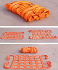 Heavy Duty Hoisting Net For Secure Equipment Transport And Construction Projects 100x100 Cm Mesh Grid 10 Cm 300 Kg Capacity Built For The Jobsite Pro Grade Industrial Strength Lifting Net, orange webbing folded and laid flat