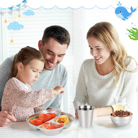Family enjoying meal with Heavy Hitter 15 Piece Stainless Steel Kids Dinnerware Set With Three Compartment Plates And Spill Proof Cups Bowls Plus Fork Spoon Combo For Toddlers Seeking Zero Stress Mealtimes And Sick Durability.