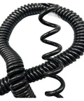 Rock Solid Retractable Coiled Power Cord with Copper Core and Hella Tough Plastic Body for Smooth Spring Spiral Stretch to 20 Meters showing coiled design.