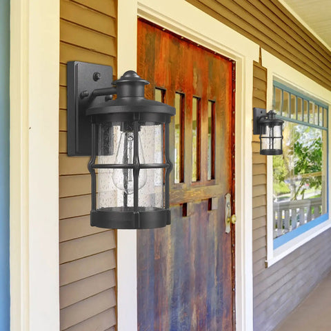 Outdoor Wall Sconces Dusk To Dawn Black Finish Seeded Glass Exterior Wall Mount Lighting 2 Pack on porch by wood door