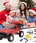 Family with Christmas gifts and Off Road RC Truck One Sixteen Scale Beast With Proportional Steering And 2 4Ghz 2CH 4WD Drivetrain All Terrain Rock Crawler RTR.
