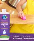 Person using Pure Mineral Oil for Cutting Boards and Food Prep Surfaces Legit Food Grade Kosher GMO Free Deep Penetrating Wood Protector