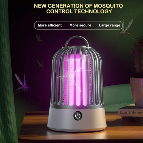 Indoor Outdoor USB Powered Bug Zapper That Slays Mosquitoes, Flies, And Wasps With UV Light, Quiet Dehydration Grid on table.