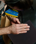 Heavy Duty Wet Sandpaper Assortment Ranging From 60 To 320 Grit Sheets used for smoothing metal surfaces.