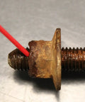 Close-up of rusted bolt treated with Green Wonder 300 Ml Plant Based Aerosol Cleaner And Lubricant For Doors Locks Hinges Chains And Valves