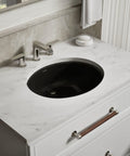Caxton Oval Undermount Bathroom Sink With Sleek Easy-To-Clean Design And Timeless Style in marble countertop