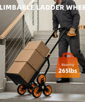 Heavy Duty Stair Climbing Dolly With Rolling Tracks And Swivel Casters Makes Moving Furniture Or Appliances Upstairs A Total Breeze. This Folding Hand Truck Carries Two Hundred Sixty Five Pounds For Rock Solid Balance On Every Step., man using dolly with boxes on stairs, 265 lbs capacity, black and orange, indoor transport
