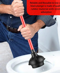 Heavy Duty Toilet Plunger 6 Pack Built With Long 20.5 Inch Handle And Four Inch Cup For Bathroom Drain Unclogging. User gripping black rubber plunger with red handle.