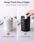 White bin with visible trash next to Tiny Matte Black Desktop Trash Can With Lid For Office Desk And Vanity 1.5 Liter Countertop Waste Bin.