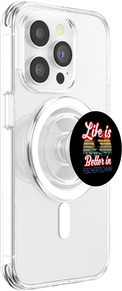 Life Is Better In Fischertechnik PopGrip For MagSafe Ski Edition, PopSockets Grip For iPhone, Winter Vacation Souvenir Gift For Skiers And Snowboarders, Funny Slopeside Keepsake For The Whole Crew. Clear iPhone case with MagSafe PopGrip