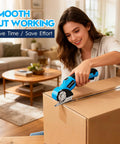 Heavy Duty Cordless Electric Scissors With Rechargeable Rotary Blade And LED Light Safety Lock For No Sweat Cutting Of Cardboard Fabric Carpet Leather And Cloth Slick Power Shears Blue being used to cut a box.
