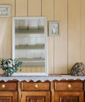 Luxury Solid Real Unlacquered Brass Cabinet Knobs Handmade Heavyweight Builds on wooden dresser with mirror and decor.
