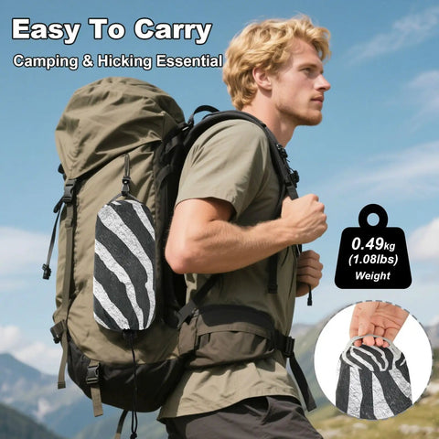 Hiker carrying backpack with Zebra Inspired Camping Hammock With Tree Straps And Travel Bag Easy Setup No Knot Straps Ultra Thickened Durable 500 Pound Capacity Portable Single Hammock for outdoor use