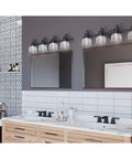 Bathroom with Archie Collection 4-Light Bath Vanity Light With Clear Double Prismatic Glass Shades In Venetian Bronze Finish