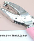 Handheld Paper And Leather Hole Punch, 6.3 Inch Long, One Sixteenth Inch Hole Diameter, Puncher For Paper And Leather Up To About Ten To Fifteen Sheets, Pink Soft Thick Leather Cover, S Circle shown on leather surface