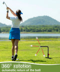 Woman practicing with Indoor Golf Swing Trainer With 3 Height Levels Pro Grade Iron Practice Swing Groover in natural setting