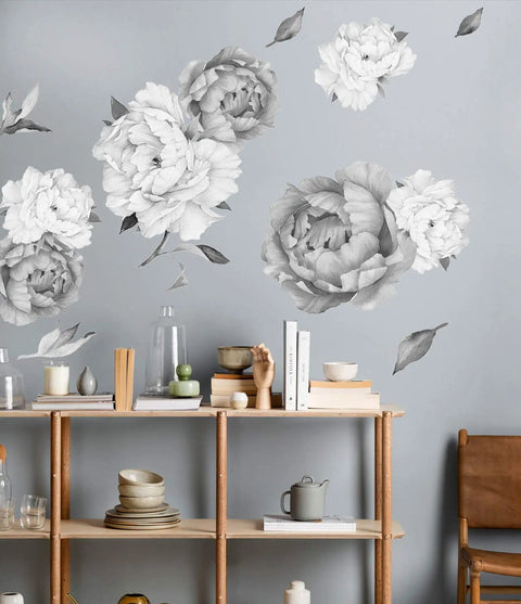 Easy Peel And Stick Black And White Peony Watercolor Wall Decals Set Of 8 above wooden shelf in cozy chic living room decor.