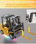 Mini 1:64 Scale Remote Control Liftable Forklift Toy With All Metal Die Cast Body showing forks and hook switching feature