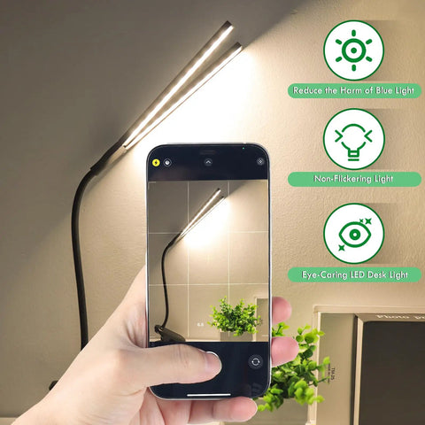 Two Head LED Reading Light With Clip, USB Rechargeable Desk Lamp, 48 LEDs, stepless dimming, flexible neck shown beside smartphone