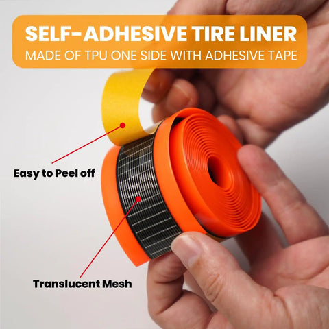 Person holding self-adhesive tire liner, TPU material, for Road Bike Tire Liner Self Adhesive Inner Tube Protector For 700c And 28 Inch Tires Puncture Proof Shield For Road And MTB Wide 23mm Roadie Friendly And Durable Self Adhesive Protective Layer Fits Most 700c Road And MTB Tires.