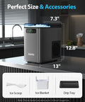 Nugget Ice Maker 40 Lbs Per Day Countertop Ice Machine With One Click Operation Fast 5 Minute Ice Auto Self Cleaning Soft Chewable Pebble Ice Includes Scoop And Basket For Home Office Kitchen Party Grey showing dimensions and accessories on a kitchen counter.