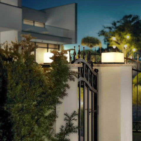 Chill Out In Style With These Modern Warm Led Post Cap Lights That Deliver Luxury Waterproof Vibes Perfect For All Your Fence Deck Garden And Patio Posts E26 Bulb Ready For Awesome Outdoor Living, illuminating a modern fence at night.