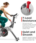 Woman using Prime Magnetic Belt Drive Indoor Stationary Cycling Bike With Bluetooth App Connectivity And Two Stage Transmission System