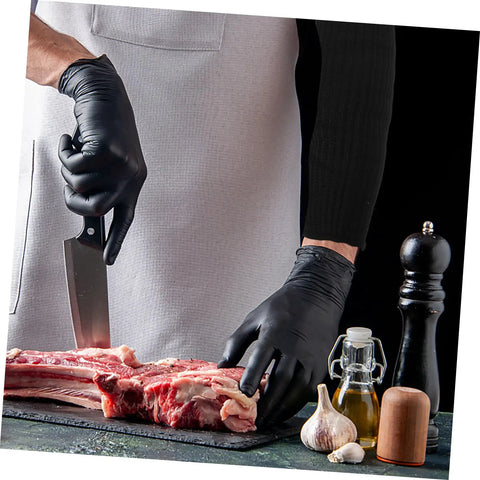 Heavy Duty Cut Resistant Arm Sleeves For Welding And Yard Work shield forearms while cutting meat with gloves and a knife.