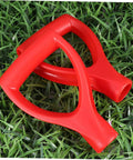 Two red D-shaped grips for Four Pack Plastic Snow Shovel Handle Replacements For Shovels And Gardening Tools on grass