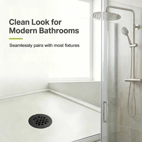Slick Matte Black Stainless Steel Shower Drain Cover Snap In Rustproof Bathroom Floor Drain Grate Heavy Duty Round Sink Filter 2 Pack in modern bathroom setting.