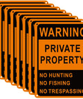Real Deal Heavy Duty Reflective Aluminum No Trespassing Signs 8 Pack Large 10x7 Orange Private Property Warning Posts For Hunters Weatherproof Outdoor Boundary Tough As Nails, featuring eight identical signs.