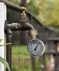 2 Inch Glycerin Filled Stainless Steel Water Pressure Gauge Built For Home And Garden Use attached to faucet outdoors