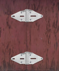 Heavy Duty Exterior Garage Door Hinge Self Closing With Bracket Replacement Kit installed on a wooden door panel