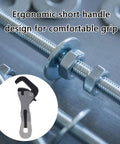 Miniature Rough Wrench Spanner With Ergonomic Grip For Quick Fixes In Furniture Assembly Automotive Repairs And Electronics A Compact Handy Tool For Tight Spaces And Precise Adjustments For DIYers And Pros shown in use on bolt.