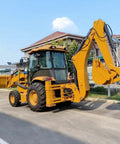 Durable Compact Backhoe Loader With Front Loader And Excavator Arm A Real Workhorse Mini Tractor Wheel Loader For Digging Trenching Earthmoving And Rural Development On Small Sites parked on a roadside