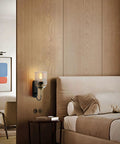 Top Shelf Modern Led Wall Sconces With Up And Down Lighting For Chill Bedrooms And Casual Living Rooms Smooth Interior Wall Lamps mounted beside a bed.