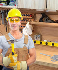 Upgraded Double Headed Skirting Seamless Nails For Interior Baseboard And Mdf Trim With No Sweat Smooth Install And Solid Grip 1 Inch Threaded End 150 Piece Pro Grade Kit Built Tough And Goes Down Clean held by worker wearing gloves in workshop.