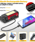 Rechargeable LED Magnetic Work Light 2 Pack With USB Charging, 2200mAh battery, USB connector, with phone attached for charging.