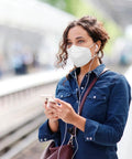 Person wearing Filtering Barrier Face Covering AFFM-5 One Size 5-Pack With Stretchable Side Bands For A Snug Fit And All Day Comfort.