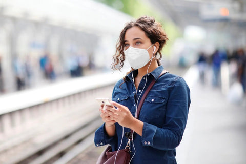 Person wearing Filtering Barrier Face Covering AFFM-5 One Size 5-Pack With Stretchable Side Bands For A Snug Fit And All Day Comfort.