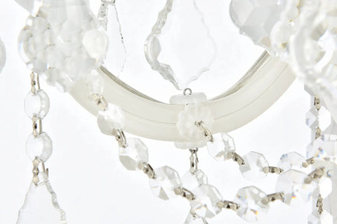 Close-up of Royal Cut Clear Maria Theresa 3 Light Crystal Wall Sconce In Chrome Finish with dazzling crystal accents.