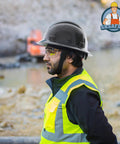 Man wearing Full Brim Hard Hat With Carbon Fiber Design, 6 Point Adjustable Ratchet Suspension, OSHA Approved ANSI Z89.1 Type I Class C