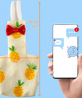 Pigeon Diaper Pants Harness And Leash For Birds No Fuss Adjustable Harness with XL Pineapple Pattern next to phone.