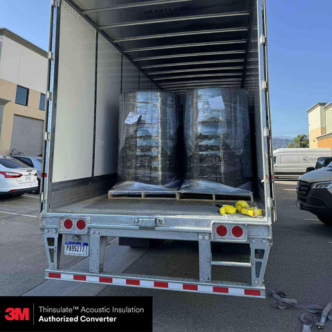Hella Slick Camper Van Insulation Panels Deliver Top Tier Thermal Soundproofing Wrap For Custom Builds stacked in a delivery truck.