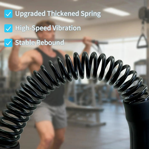 Close-up of coiled spring with person in gym using Two Pack Cordless Ropeless Battle Ropes For HIIT And Cardio in the background.