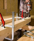 Heavy Duty Ratchet Lever Clamps 12 Inch Fast Action Welding And Woodworking Tools holding wood beams during drilling.