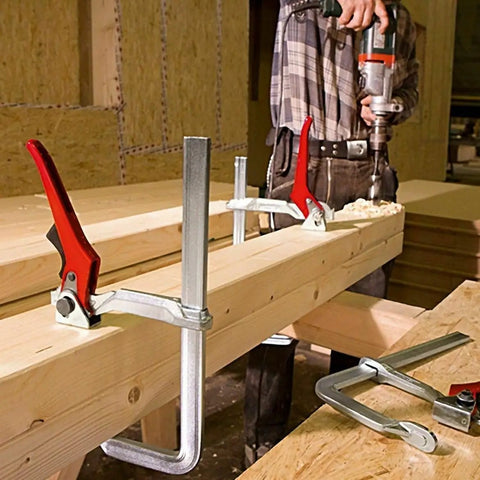 Heavy Duty Ratchet Lever Clamps 12 Inch Fast Action Welding And Woodworking Tools holding wood beams during drilling.