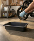 Heavy Duty 6 Liter Square Oil Drain Pan With Long Spout For Garage Home Mechanics And Workshop Deep Basin To Catch Engine Lube Mess Free, with oil being poured.