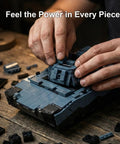 Hands assembling Epic Military RC Abrams-X Tank Beast 2116-Piece Building Set for Adults on a wooden table.