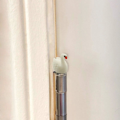 Whimsical Mini Swan Hinge Head Magnets Set Of 6 For Door Decor And Metal Surfaces installed on hinge pin